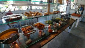 blurry photo of the food set-up at 9 Warung in Ubud