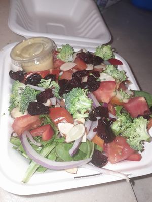 Salad with almonds cranberry Tomatoes Purple Onion at Chef W Vegan Lunchbox in Nassau