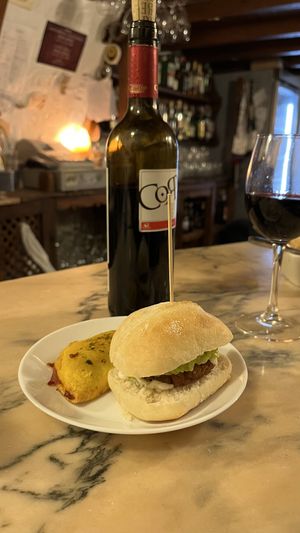 Mini burger y empanada de pisto  at El Rastrel Etic Cafe in Salamanca