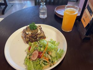 Vegan moussaka and freshly squeezed orange juice  at Prem Bistro and Cafe in Ho Chi Minh City