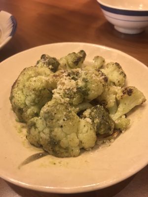 Side Dish: Roasted Cauliflower in pesto sauce - topped with grated parmesan cheese  at Prem Bistro and Cafe in Ho Chi Minh City