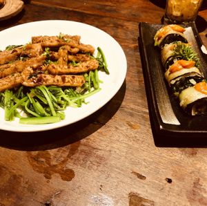 Eggplant rolls, stir fried kale & tempeh  at Prem Bistro and Cafe in Ho Chi Minh City
