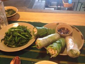 fresh spring rolls and spinach with garlic at Prem Bistro and Cafe in Ho Chi Minh City