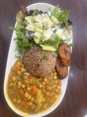 Chickpea curry with rice and salad  at Vital-Life Vegan in Toronto
