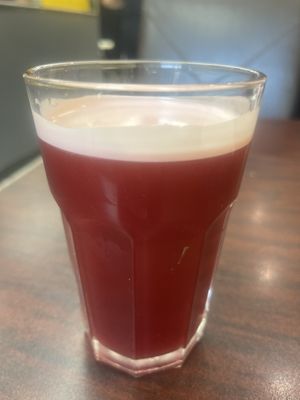 Freshly prepared sorrel ginger juice  at Vital-Life Vegan in Toronto