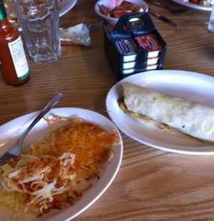 Veggie Breakfast Burrito (1/2 order, can get 2 burritos) and side of hashbrowns "lightly oiled" at Golden Harvest Cafe in Arcata