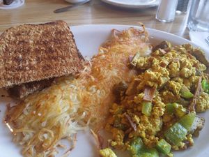 Tofu scramble with tofu bacon, peppers, soysage, hashbrowns and toast at Golden Harvest Cafe in Arcata