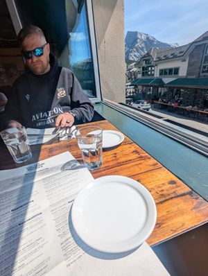 Table with open window view at The Old Spaghetti Factory in Banff