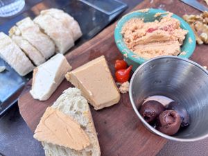 We started chowing the vegan food plate before I remembered to take the photo. So good!  at Wine Down on Main in Brevard