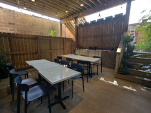 Outdoor seating behind the restaurant at Neon Greens  in St Louis