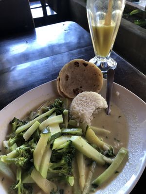 green curry with rice and green veggies. Pineapple agua. (i asked for corn tortillas because i can’t eat the pitta it comes with)  at Clover in San Pedro La Laguna