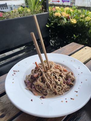 Malaysian noodles with tofu, veggies and peanut sauce   at Nice 'n Spicy in Roatan