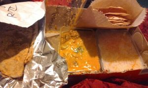 take away roti, potato, pumpkin & mushroom curry, saffron rice and pappadams at Food O'Clock Cafe in Bendigo