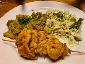 Lentils and potato's with battered veg skewer at Vege Club Amar in Szczecin