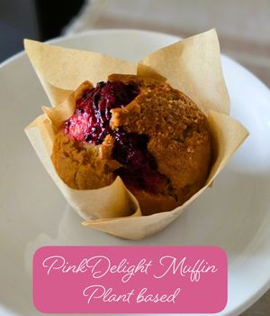 Soft muffin bursting with luscious homemade dragon fruit jam — a naturally vibrant, fruity treat. at Botanic Bake in North Singapore