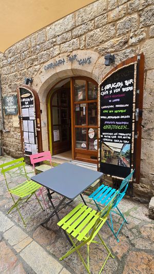 Entrance at the back street at l'Abracada bar in Gorges Du Tarn Causses