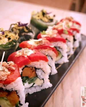 Piman cheese (marinated bell pepper, sweet potato, avocado, vegetable cheese, fried onion, spicy sauce) very appetizing. at Bloom Sushi in Lyon