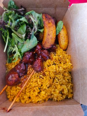 The BBQ platter with plantains. at Casa Borinqueña in Philadelphia