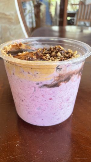 Frozen smoothie bowl with vegan protein & custom toppings.  at Smoothie House  in Atenas