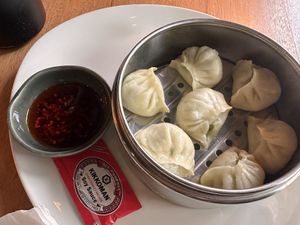Veggie momos. Were slightly undercooked this time around😒  at Momo Cafe in Minneapolis