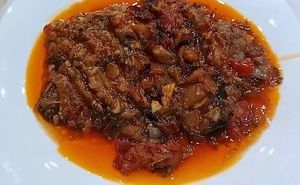 Stuffed eggplant comes with a bit of sauce at Te Bequa 2 in Sarande