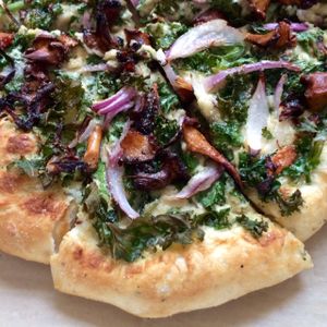 Kale, béchamel, chanterelle pizza.  at Seedz Cafe in St Louis