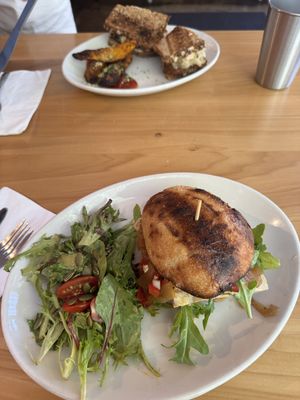 Italian Tempeh Sandwich w/ side salad & Seedz Reuben w/ potato wedges .  at Seedz Cafe in St Louis