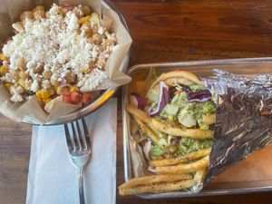 Vegan gyro (I ate some fries off the top before I took photo) oops🫣 and quinoa side salad (forgot to ask them to hold the feta) at Spitz in Bozeman
