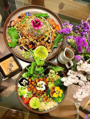 Pad thai and a buddha bowl - such lovely presentation 🌸  at Street Vegano - Cafe Restaurante in Cusco