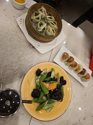 Stir-fried fried okra dish, steamed dumplings and pan fried dumplings at Gong De Lin - Preston in Preston