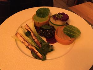 Sausage "gnocchi" with different vegetable purée at Em Carne Viva in Porto