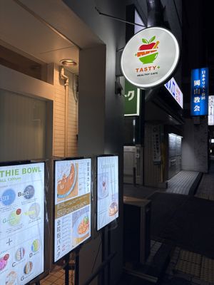 Restaurant sign  at Tasty+ in Okayama