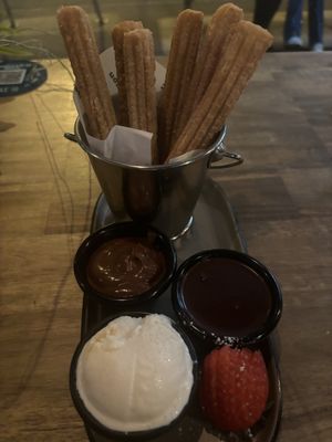 Churros with hazelnut and chocolate sauces and house made vanilla ice cream   at Brother Bon in Northcote