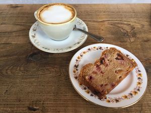 Plum cake (vegan) and oat milk americano at EZ and Moss in North London