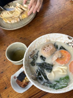 Miso soup and peanut butter and banana bread in the background   at Chay Station in Da Lat