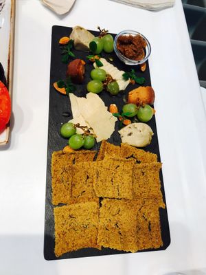 Cheese Plate with fig confit and crackers at Super Natural Kitchen in Dubai