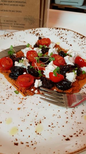 pizza putanesca at Super Natural Kitchen in Dubai