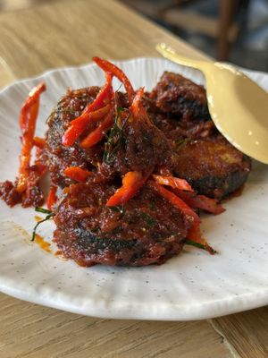 Stir fried plant based “cat fish” with red curryy  at Sukjai by Pata Obasan in Chiang Mai