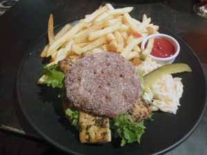 Tree Hugger Burger: organic tofu, avocado, hummus, eggplant.  at Bar Loosister in Helsinki