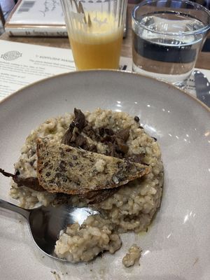 Oops already started the mushroom risotto and a fresh orange juicee  at Koffushi in Tenerife