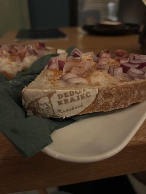 Sourdough bread with vegan grease and red onion  at Pelech in Trencianske Teplice