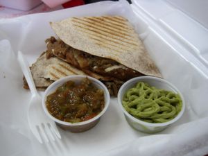 Quesadillas (whole wheat tortilla, refried beans, vegan cheese, vegan chicken, served with salsa and guacamole). This is a good option if you don't feel like eating Middle Eastern cuisine, which is 57Cals' specialty. at 57 Cals in Laval