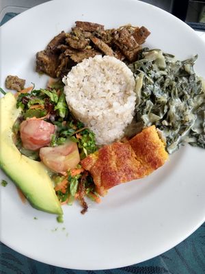 Main plate: seitán, salad, plantain, acelga, rice at Flor de Loto in Bogota