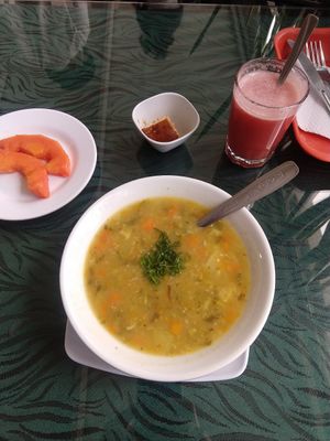 Papaya, quinoa soup, strawberry juice drink, tiny dessert at Flor de Loto in Bogota