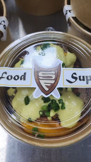 Super Stuffed Peppers with Cheeze Sauce at SuperFast SuperFood in Xian