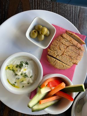 cheese dip made in-house and in-house gluten free bread at 222 Vegan Cuisine in West London
