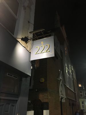 Sign out front at 222 Vegan Cuisine in West London