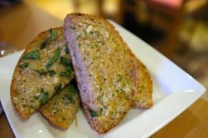 Bread, with garlic and oil and herbs. at 222 Vegan Cuisine in West London