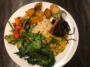 Veggies, potatoes, rice, chickpeas  at 222 Vegan Cuisine in West London