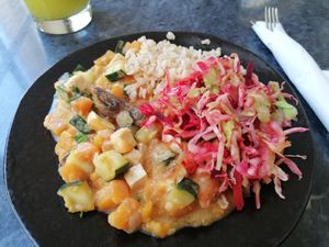 Thai curry, rice and salad  at Alfarroba in Lisbon